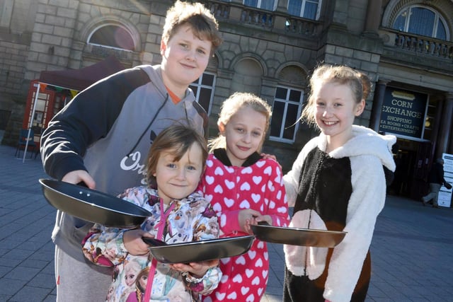 Connor Jackline, 12, of Scawsby, pictured with his sister, Kelsie, six, cousin Kiera Molloy, ten and sister Aimee Jackline, ten at the DOncaster pancake Olympics in 2015