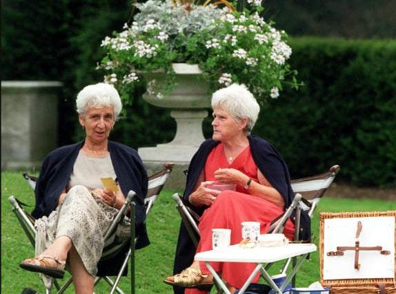 Two ladies enjoying the garden with a cup of tea in 1999.