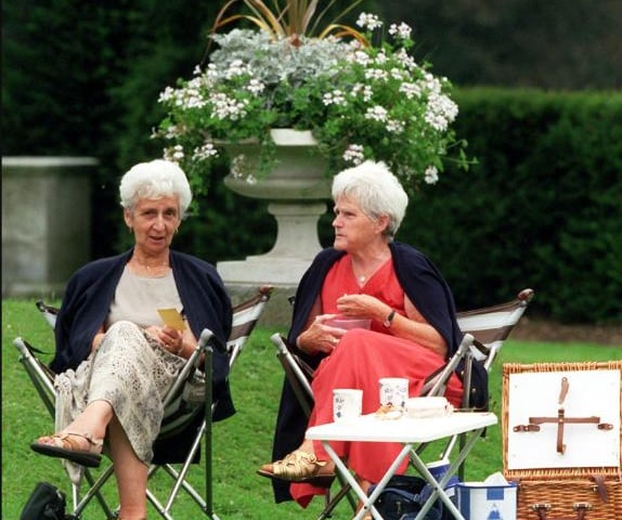 Two ladies enjoying the garden with a cup of tea in 1999.