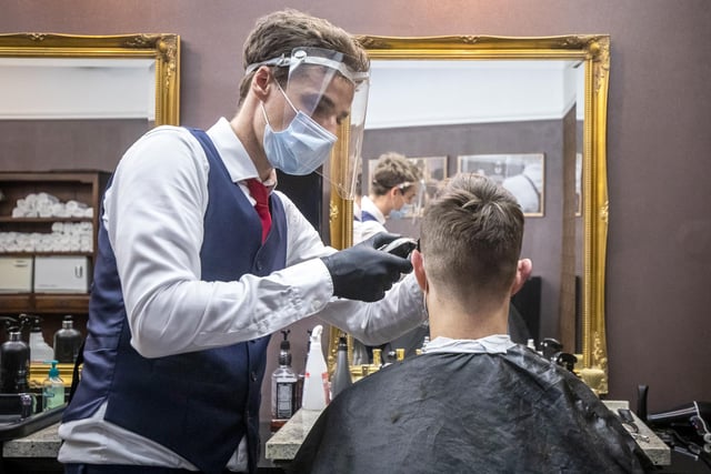 When lockdown was put in place it dawned on people that they wouldn't be able to get a professional haircut - some have attempted a home cut, while others are waiting it out until salons reopen. It is thought barbers and hairdressers may be able to go back to work in July; the picture is from the Czech Republic, which suggests what the experience might be like in England.