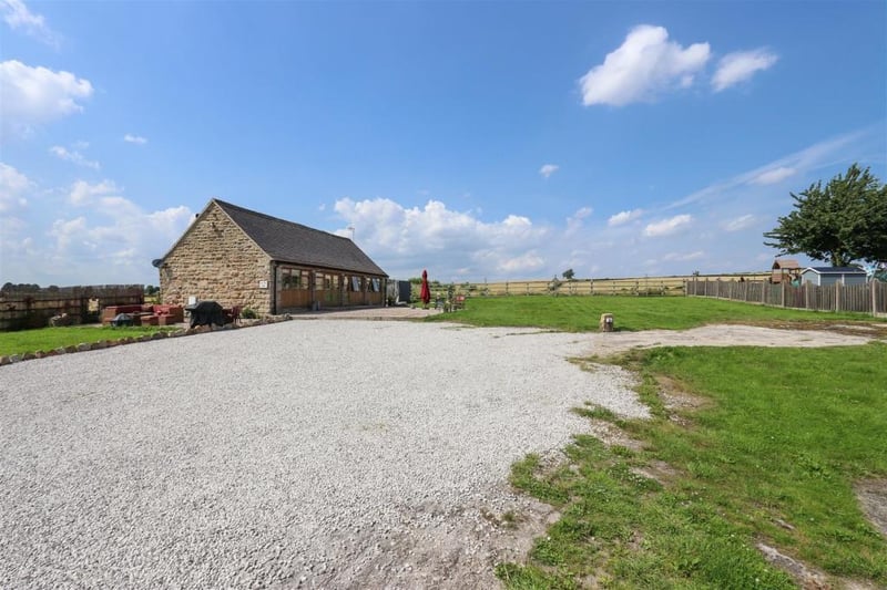 The grounds included in the sale total about 3.5 acres and consist of the roadway entrance, 0.5 acres surrounding Oak Tree Barn and a large paddock.