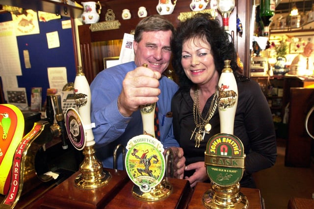 The Corner Pin, in St Sepulchre Gate, has been named Doncaster CAMARA's pub of the year in 2002. Our picture shows landlord and landlady Alan and Kath Day celebrating their success.