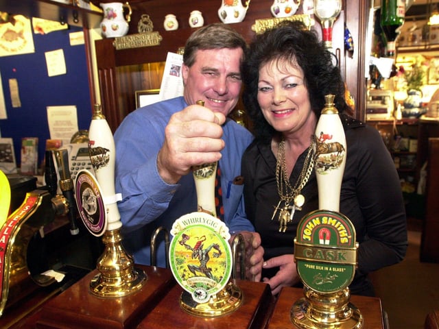 The Corner Pin, in St Sepulchre Gate, has been named Doncaster CAMARA's pub of the year in 2002. Our picture shows landlord and landlady Alan and Kath Day celebrating their success.