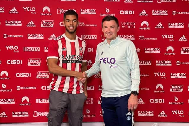 Miguel Freckleton shakes hands with Paul Heckingbottom after signing for Sheffield United: Miguel Freckleton/Instagram