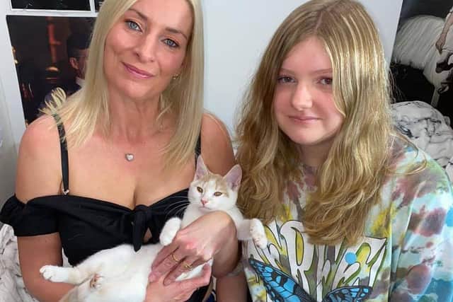 Cheryl and Zoe with Arthur the kitten.