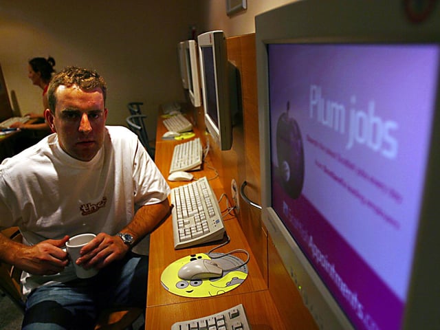 Th:at Internet Cafe owner Paul Taylor at his internet cafe in Brougham Place.