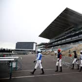 Jockeys make their way out at Doncaster. Photo: Tim Goode - Pool / Getty Images
