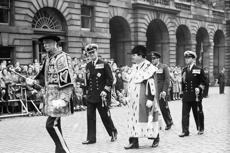 Edinburgh Festival opening Prince Philip, Duke of Edinburgh and Lord Provost James Miller lead the procession up the Royal Mile from Edinburgh City Chambers to St Giles, 1952.
