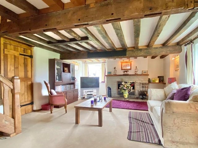 The property's magnificent lounge from a third angle. Relaxing in here must be like going back in time.