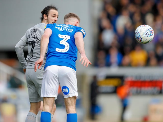 Ryan Williams challenges for the ball