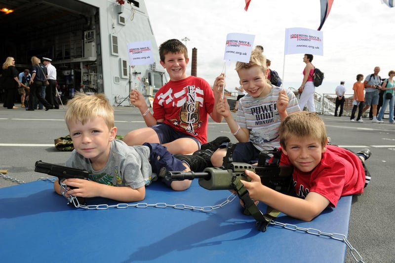 30th July 2010. Navy Days at the Portsmouth Naval Base. Pictured onboard HMS Dauntless are L-R Ethan Hiles 5, Matthew Howells 9, Morgan Hiles 7 and Robert Howells 10 (brothers and cousins) 
Picture: Paul Jacobs  102427-9