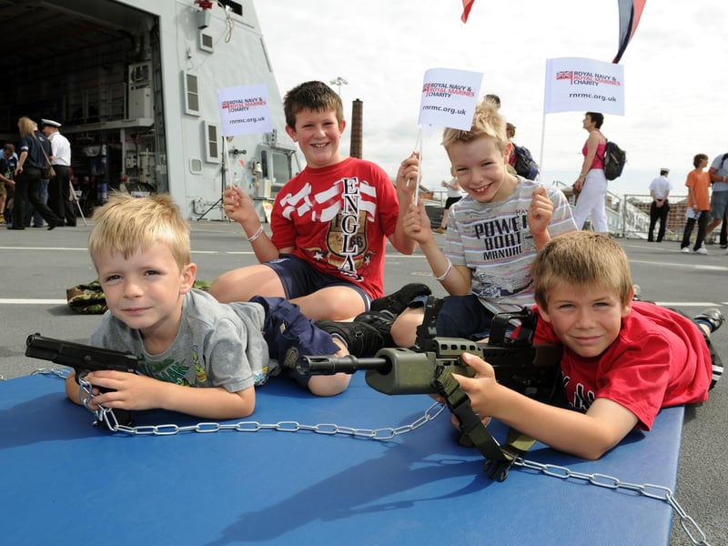 30th July 2010. Navy Days at the Portsmouth Naval Base. Pictured onboard HMS Dauntless are L-R Ethan Hiles 5, Matthew Howells 9, Morgan Hiles 7 and Robert Howells 10 (brothers and cousins)
Picture: Paul Jacobs 102427-9