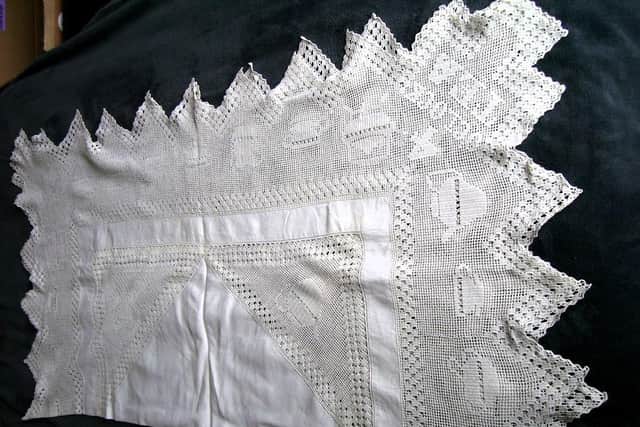 The tablecloth was made in the late 1920s or early 1930s.