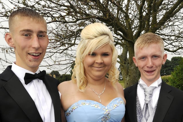 Elliot Patterson, Caitlin Moyle and Ryan Roberts smile for the camera.