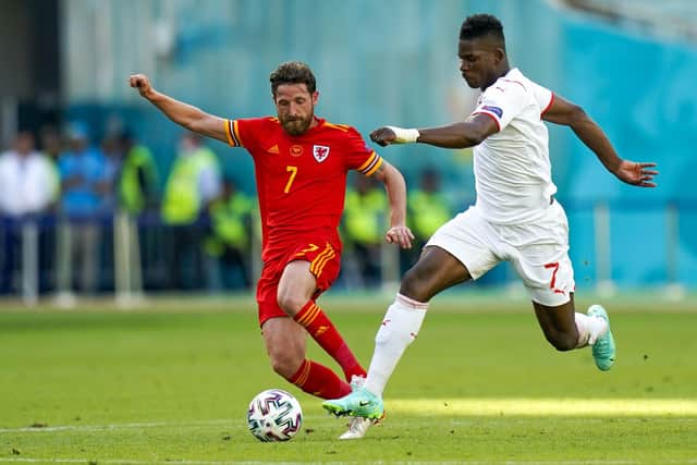 oe Allen (left) and Switzerland's Breel Embolo battle for the ball during the UEFA Euro 2020 Group A match at the Baku Olympic Stadium, Azerbaijan. Picture date: Saturday June 12, 2021: PA Wire.