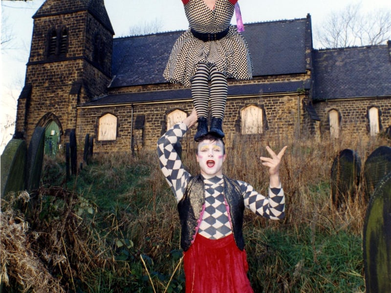 Swamp Circus performers outside their new headquarters, St. Thomas' Church, Holywell Road, in December 1995.