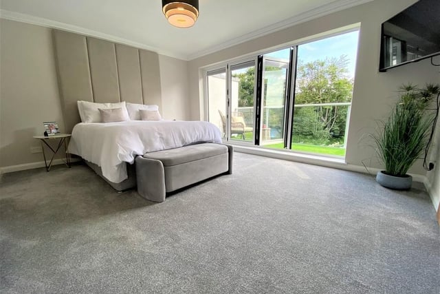 This master bedroom is stunning and is once again extremely bright. It has a dressing room to the right of the entrance and an incredibly large en-suite to the left.