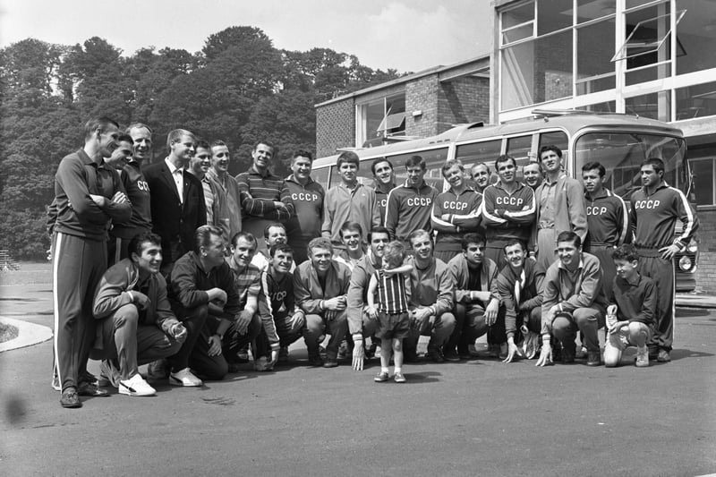 The popular Russian football team, pictured at their training headquarters at Maiden Castle, Durham, endeared themselves to local people in 1966. Pictured at the front of the team line-up is Cameron Henderson (2), son of Mr Alec Henderson, who was in charge of the sports centre.  The Russians adopted Cameron as their mascot.