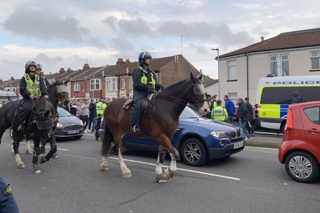 Police ran their 'biggest ever football operation' in Hampshire on September 24 as Pompey played Southampton at Fratton Park for the third round of the Carabao Cup.

Pictured is: Police near Fratton station ahead of Southampton fans arriving.

Picture: Ben Fishwick (240919-9759)