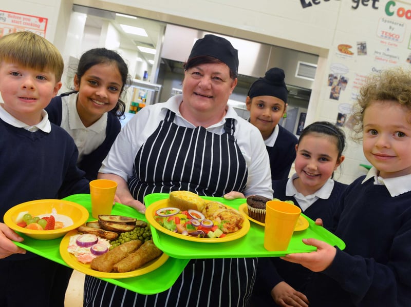 Stanhope Primary School cook Lynn Curtin was pictured ahead of International School Meals Day in 2017 with Cody Headley, Bisma Khawaja, Jaspreet Singh, Jessica Paul, and Emily Kouhy.