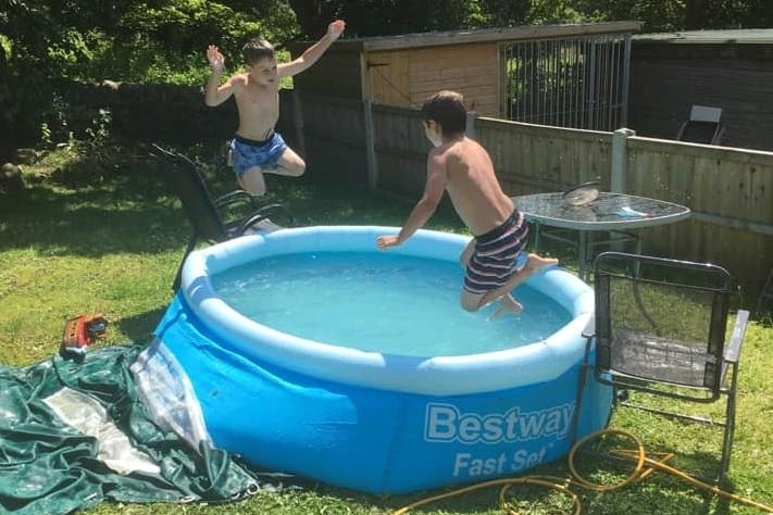 Jenny Blakey posted this photo of her sons  Rory, 7, and Dougie, 5,  jumping into a paddling pool in the family's garden at Lea Bridge. Jenny said:  "They loved it! "