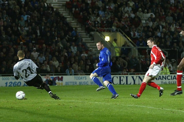 Rooney scores his first ever goal at Wrexham in the cup.