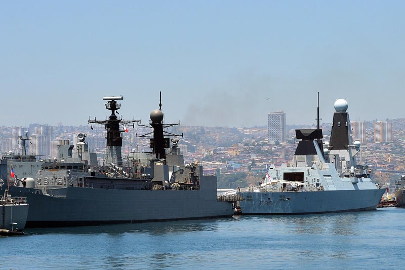 December 2014. HMS Dragon has taken part in a First World War commemoration and naval exhibition in Chile.
Under brilliant Pacific skies within sight of the coast of Chile the heads of the Royal, Canadian, German and Chilean Navies saluted the fallen of the First World War.