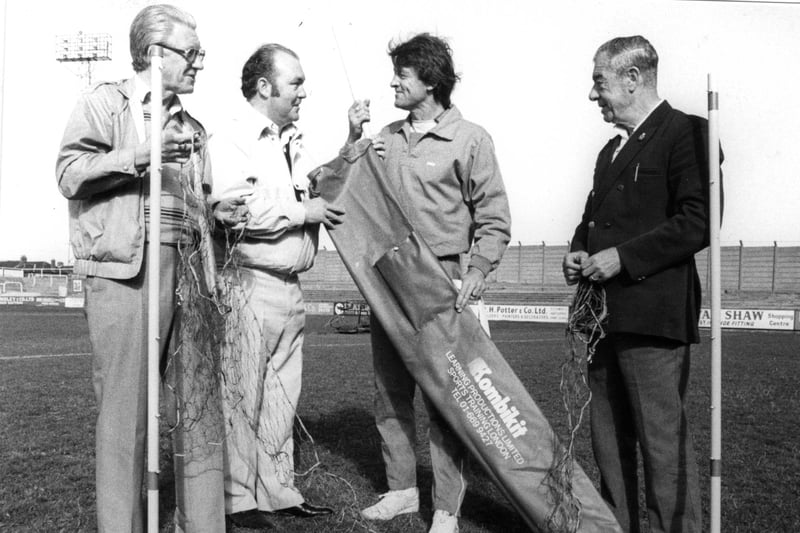 Hartlepool United manager John Bird is being presented with training equipment by Supporters Association members Ian Newton, Alf Hooks and Lloyd McKay in this photo.