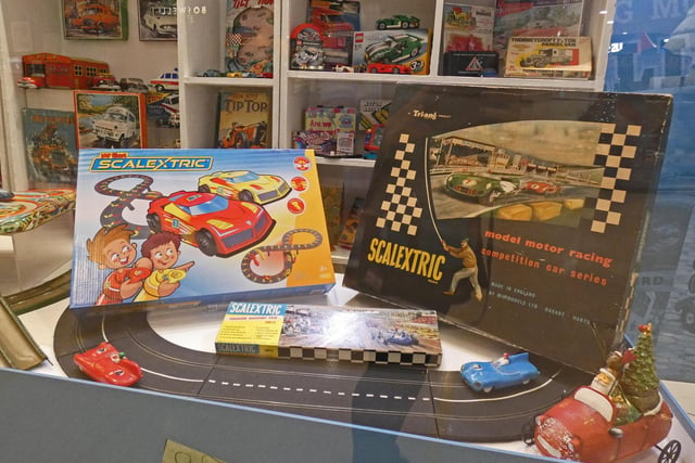 The exhibition showcases toys from all ages, including Scalextric layouts.