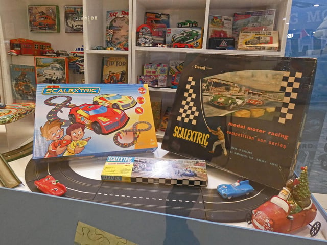 The exhibition showcases toys from all ages, including Scalextric layouts.