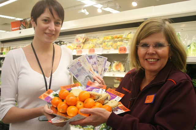 Sainsburys Chesterfield 'Recipe Evening' aids Ashgate Hospice. Alison Ward (Ashgate Hospice)left,receives the cash from Sally Craike (Sainsburys Food Adviser) in 2009