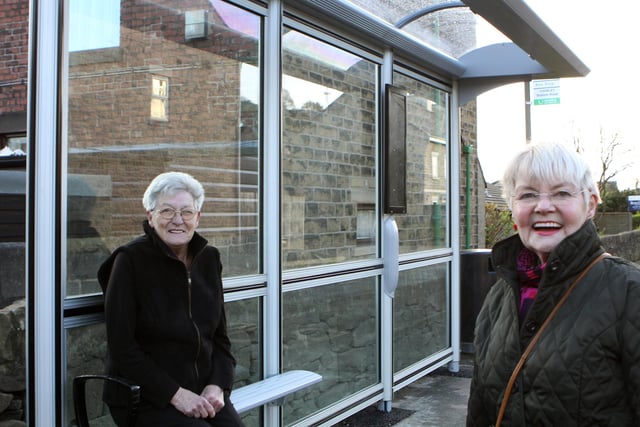 Resident Chris Foster and Councillor Audrey Bramah waiting at the Chinley bus shelter in 2011