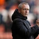 BLACKPOOL, ENGLAND - JANUARY 01: Neil Critchley, Manager of Blackpool applauds prior to the Sky Bet Championship match between Blackpool and Hull City at Bloomfield Road on January 01, 2022 in Blackpool, England. (Photo by Lewis Storey/Getty Images)