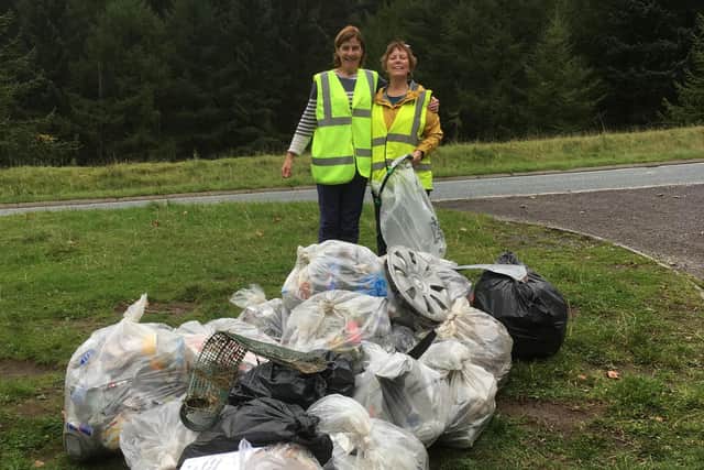 Sheffield Litter Pickers volunteers with some of the bags of rubbish they collected from the Snake Pass Sheffield to Manchester route
