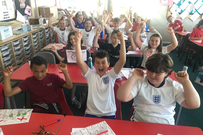Throston Primary School pupils celebrate after England's win against Denmark.