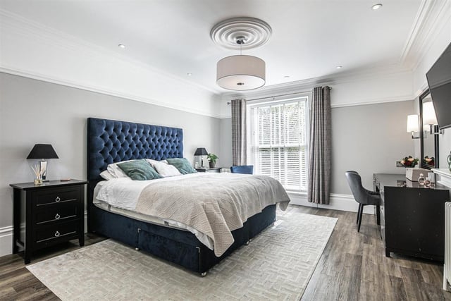 the large master bedroom comes with a luxurious en suite