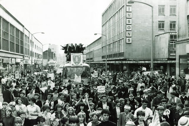The Moor is packed with fans as Sheffield welcomes home the Wednesday players after the FA Cup final with Everton.