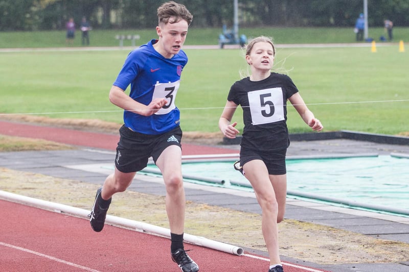 Jedburgh's Callum Auchinleck, No 3, and Hawick's Carra McLeod, No 5, competing in a 90m youth heat