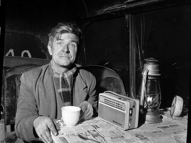 John McDonald, the nightwatchman at Leith Fort Flats in April 1960. The two 20-storey tower blocks, Cairngorm House and Grampian House, were designed between 1957 and 1963.
