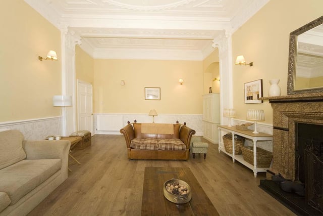 The beautifully ornate plasterwork and delightful flooring really make the main sitting room stand out with its high ceilings and huge amount of natural light.