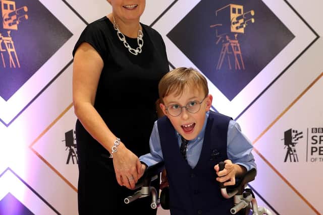 Tobias Weller with his mother Ruth Garbutt arrives for the BBC Sports Personality of the Year 2020 at MediaCityUK, Salford. PA Photo.