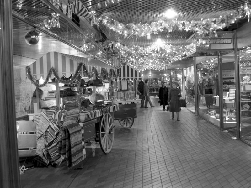 Edinburgh shopping centre Waverley Market decorated with Christmas lights for shoppers in December 1985.