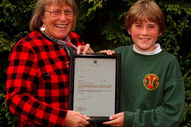 Helen Jackson MP for Hillsborough with 13-year-old Richard Howard and the letter from Tony Blair about the freedom to roam, pictured at the mass rally of ramblers at Hope Valley College in 1999