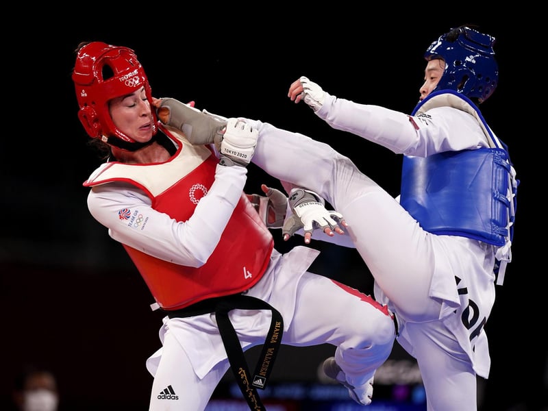 Republic of Koreaâ's Dabin Lee (right) in action against Great Britain's Bianca Walkden (left) during the Women's +67kg semi-final bout at Makuhari Messe Hall