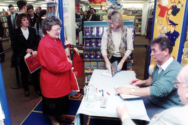 Pictured at W H Smith's, Fargate, Sheffield, where Brian Clough was signing copies of his autobiography.  Seen is Brian with Brenda Rhodes from Loxley - November 15, 1994
