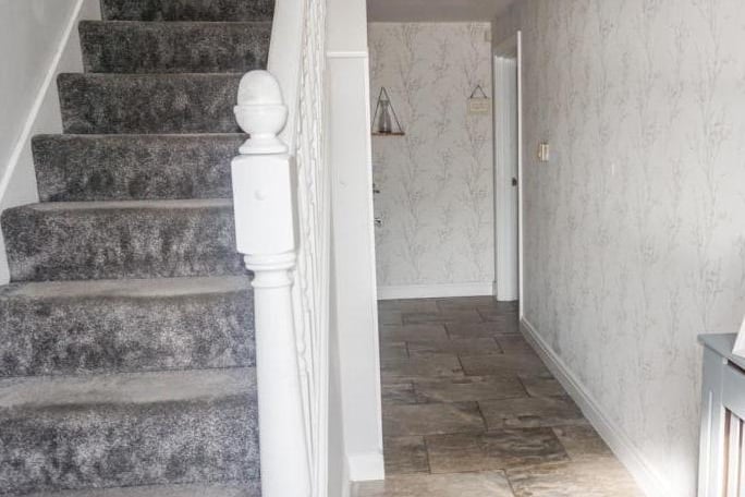 Light and airy hallway and stairs leading to first florr bedrooms
