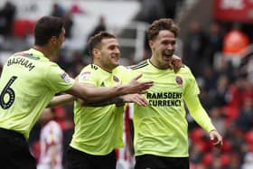 Kieran Dowell, now of Norwich City, celebrates scoring on his final appearance for Sheffield United at Stoke City: Simon Bellis/Sportimage