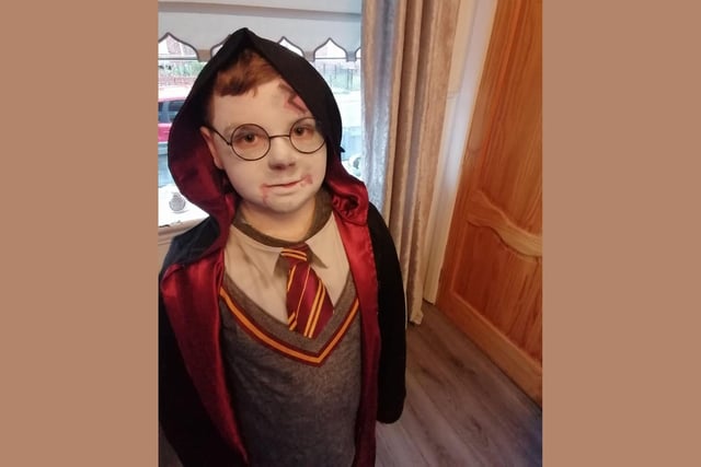 Ten year old Jack is showing off his Harry Potter look - complete with the iconic scar!