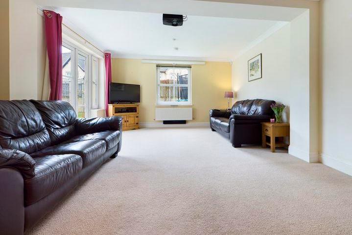 A large family room to the rear has patio doors to the rear garden so it's easy to bring the outdoors in.