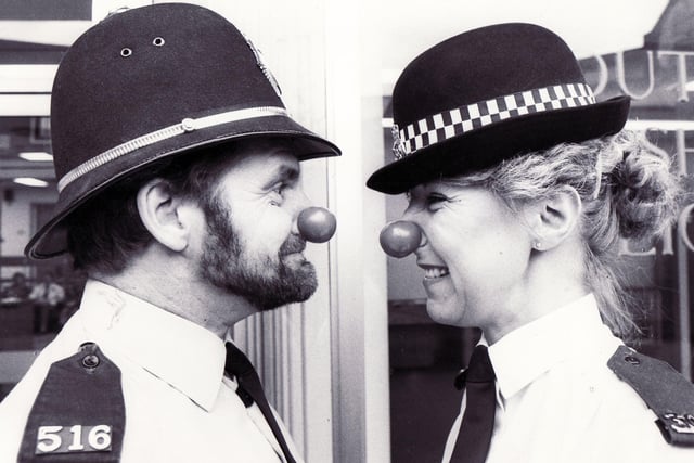 PC Barry Neal with Sue Pont join in the Comic Relief fun in 1988